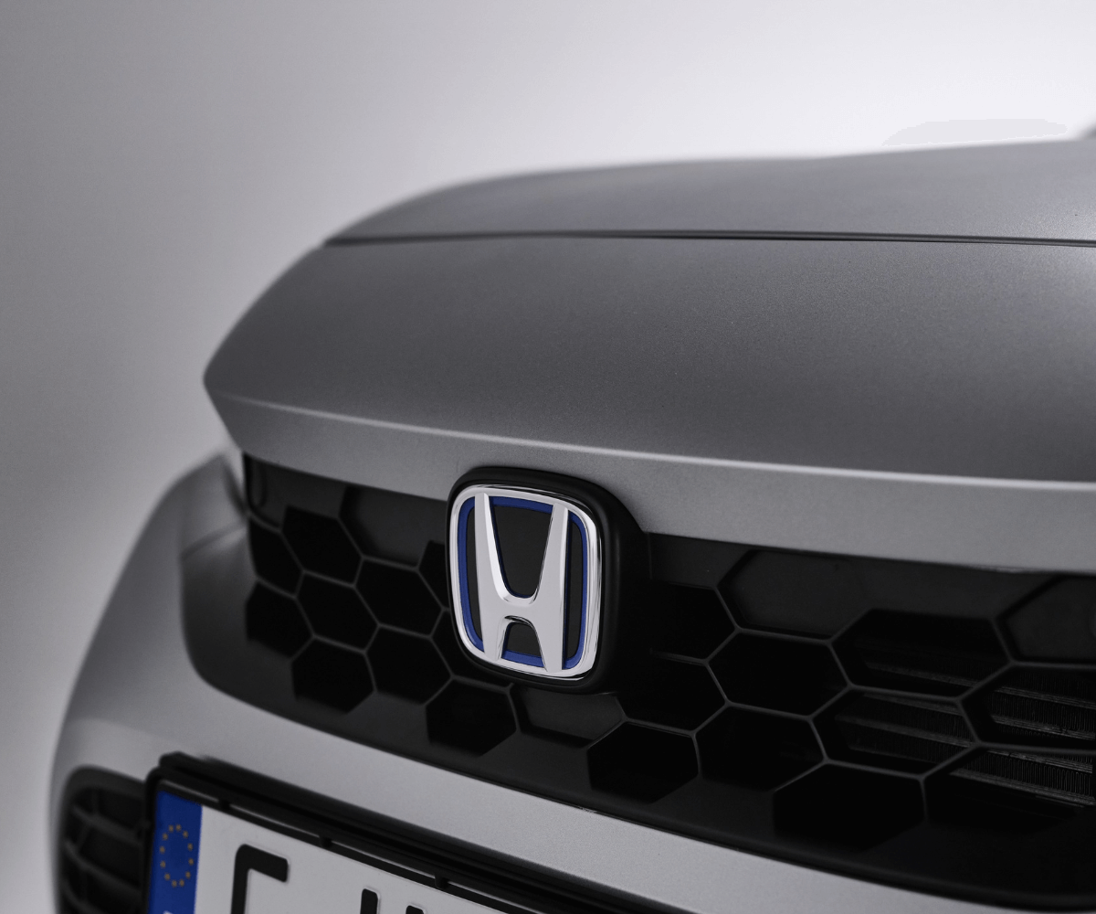 A close-up of a Honda badge